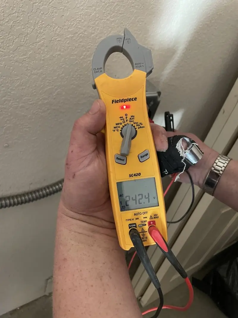 Voltage testing with clamp meter during Circuit Breaker Repair in Piedmont